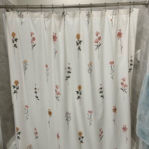 Shower curtain with rings